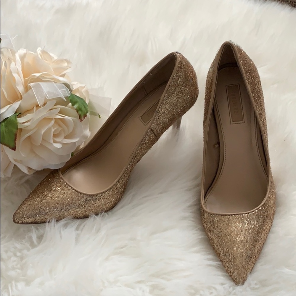 Cute gold glitter shoes.